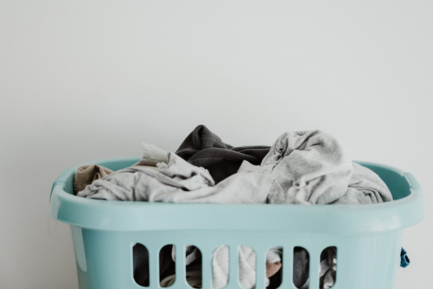 Freshly folded towels symbolizing rewards for loyal laundry customers